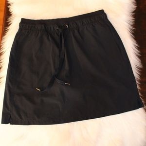 Green Tea, black skort ....